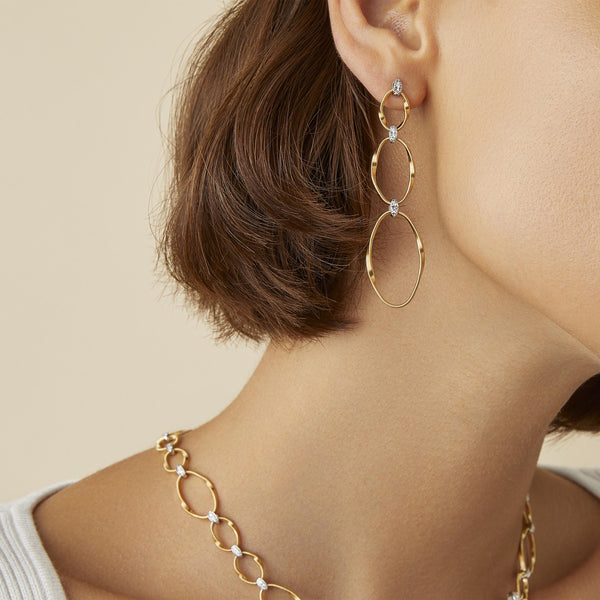 EARRINGS IN GOLD AND DIAMONDS