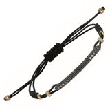 BRACELET WITH ROUNDED BAR IN GOLD AND BLACK DIAMONDS
