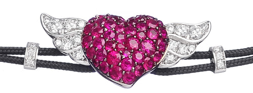 BRACELET WITH HEART  AND  WINGS IN GOLD WITH RUBIES AND DIAMONDS