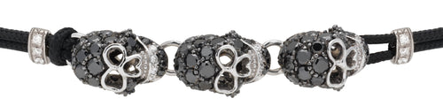 BRACELET WITH 3 SKULLS IN GOLD AND BLACK DIAMONDS