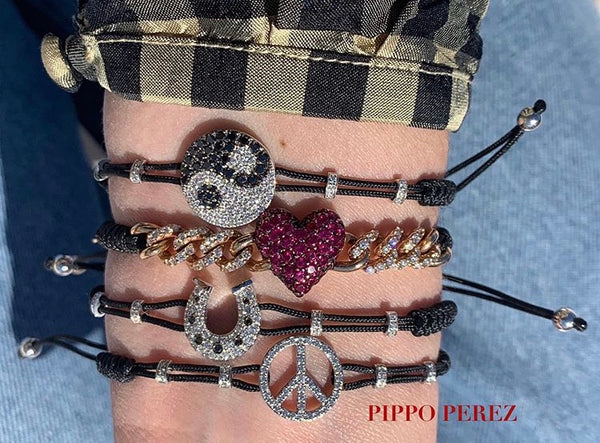 BRACELET WITH HORSESHOE IN GOLD AND DIAMONDS