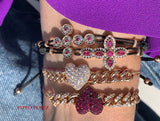 BRACELET WITH CROSS IN GOLD WITH DIAMONDS AND RUBIES
