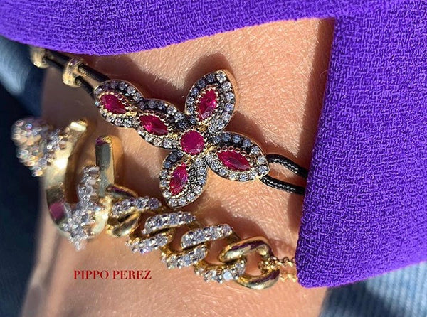 BRACELET WITH CROSS IN GOLD WITH DIAMONDS AND RUBIES