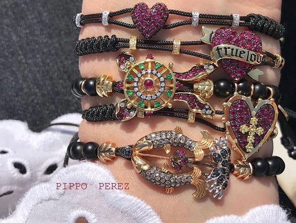 BRACELET WITH HEART IN GOLD WITH RUBIES