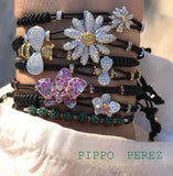 BRACELET WITH DAISY IN GOLD AND DIAMONDS