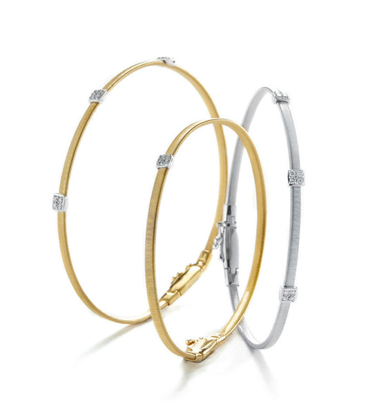 BRACELET MASAI IN GOLD AND DIAMONDS