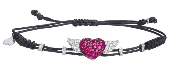 BRACELET WITH HEART  AND  WINGS IN GOLD WITH RUBIES AND DIAMONDS